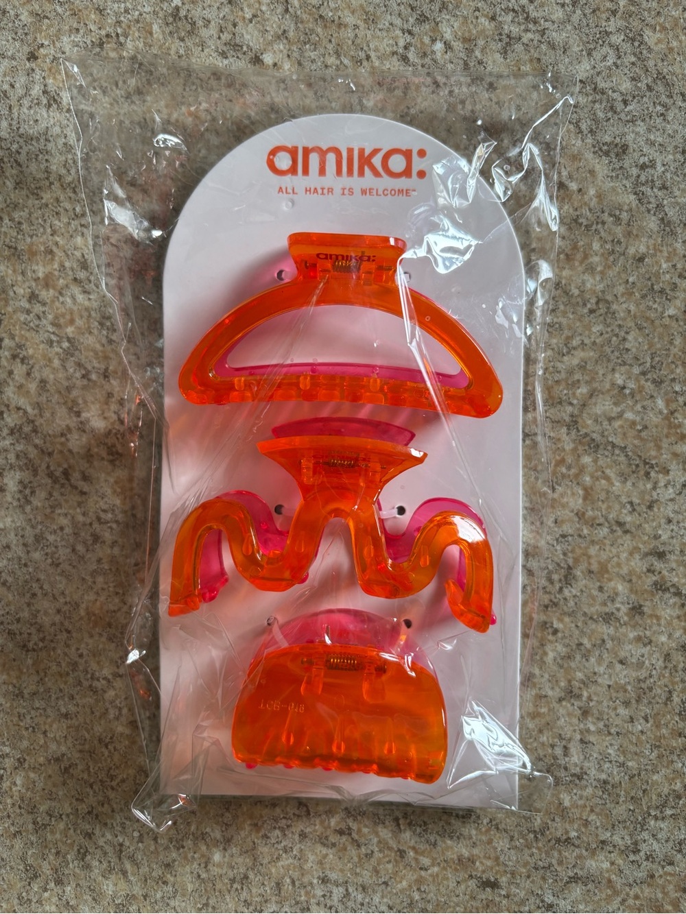 FREE with any purchase or 5 for $25. amika Clip Trio
